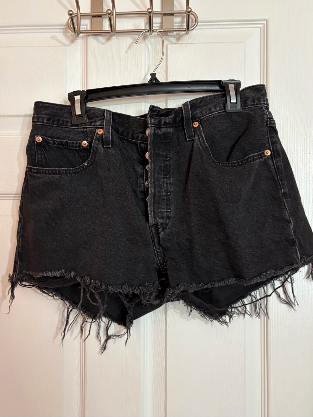 Levi’s High-Rise Black Distressed Denim Shorts